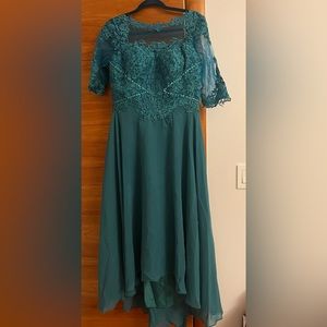 New Beautiful Women’s tea length dress with lace and chiffon detailing.